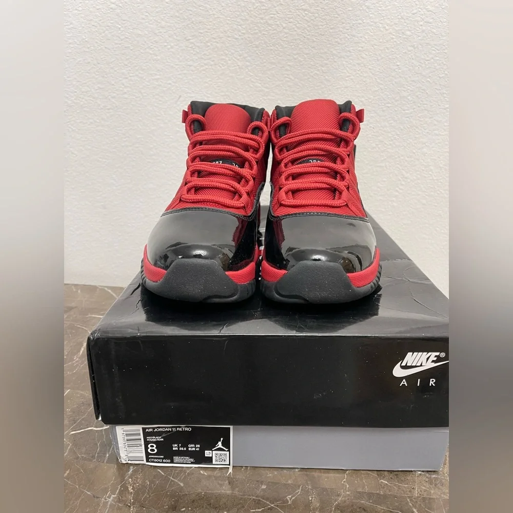 New! Unworn! Air Jordan 11 retro red and black men’s size 8